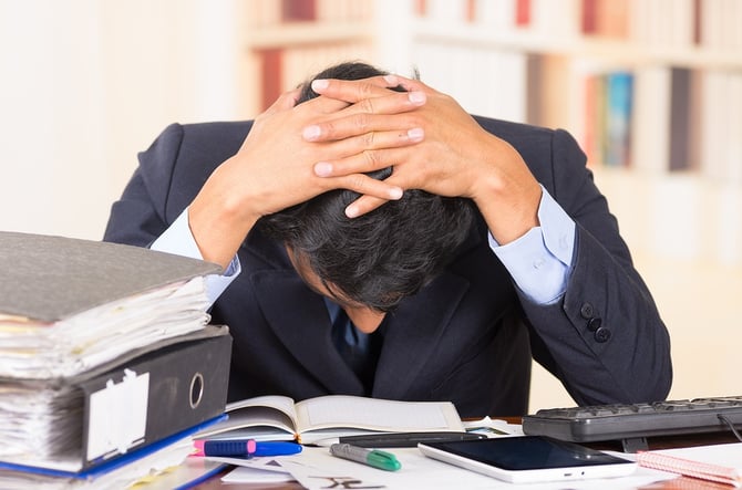 bigstock-young-stressed-overwhelmed-man-83153765